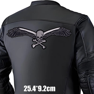 Black leather jacket with skull and wings emblem on a white background