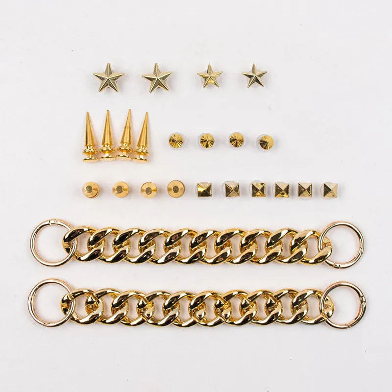 Collection of gold Rivet Shoe Charms  including chains, spikes, and star-shaped charms a white background