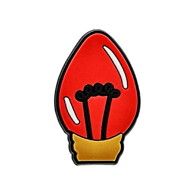 Shoe charm ornament of Red and light bulb on a white background