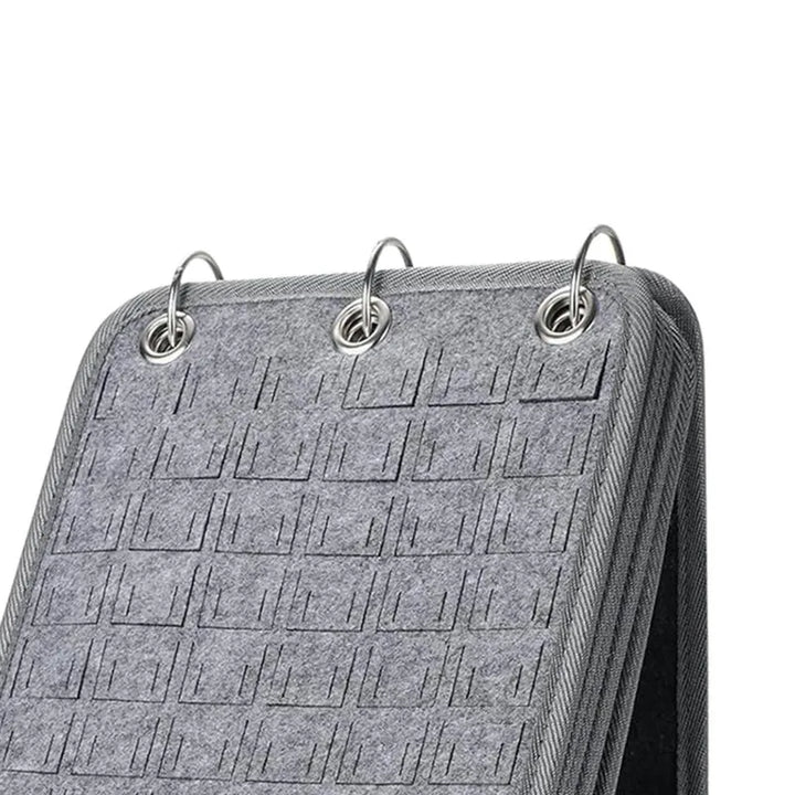 Gray Felt Pin Display Stand close up with metal rings on a white background