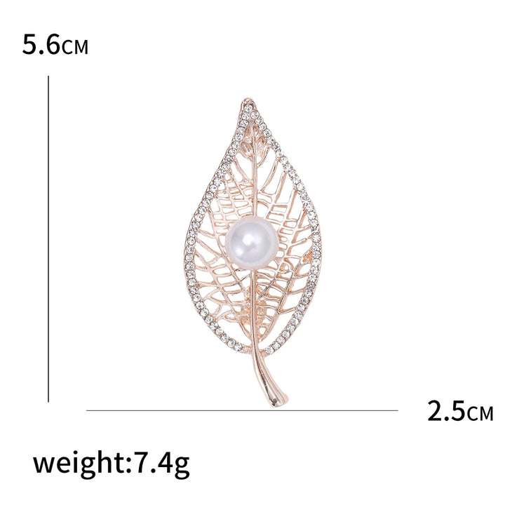Leaf-shaped brooch with pearl center and rose gold finish, shown with measurements on a white background.