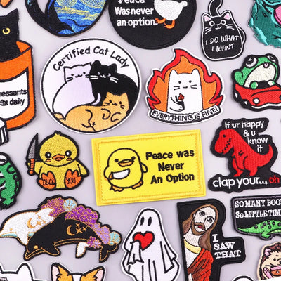 Collection of various colorful patches with different designs on a light gray background