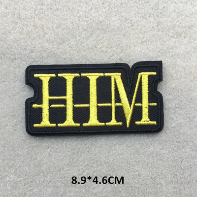 Patch with 'HIM' text on a gray background