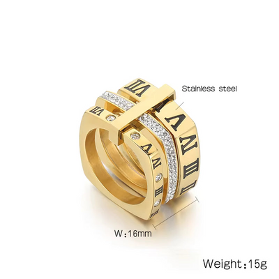 Gold ring with Roman numeral design and measurements on a white background