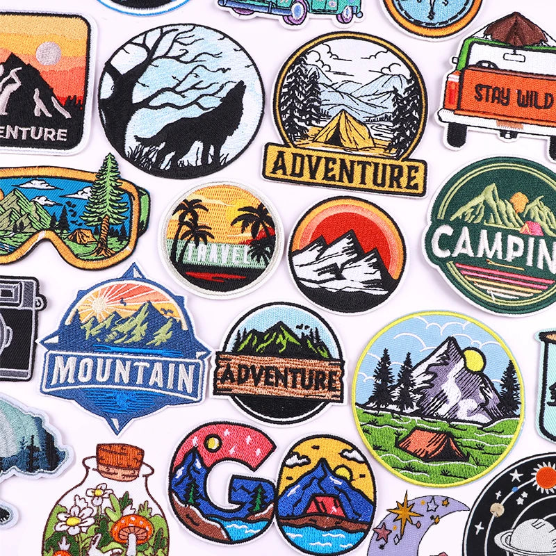 Collection of various outdoor-themed stickers on a white background