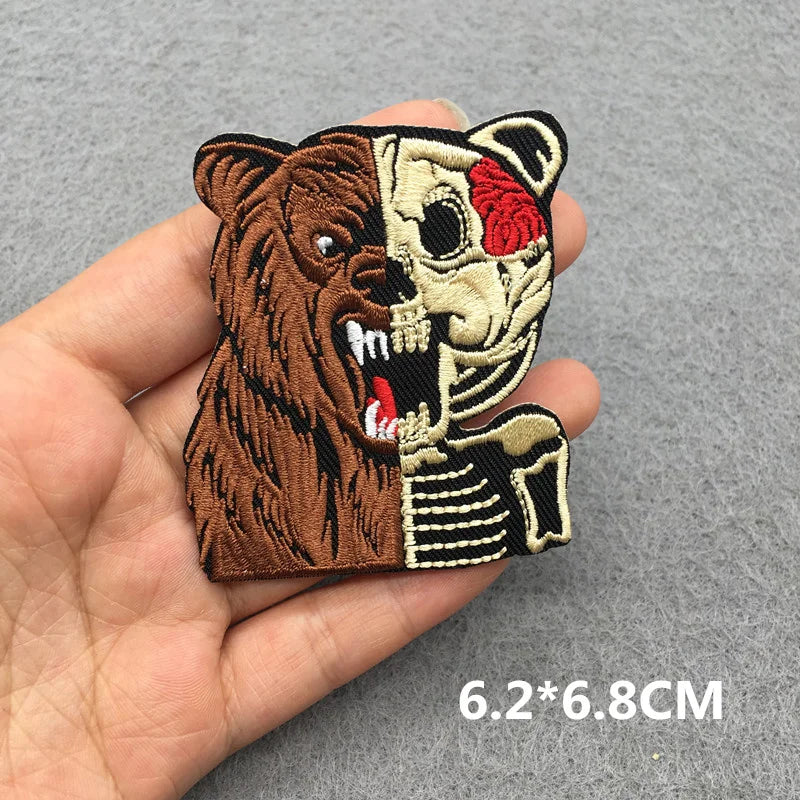 Patch of a half-tiger, half-human face held in a hand with size 6.2*6.8CM.