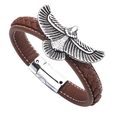Brown leather bracelet with silver eagle emblem on a white background