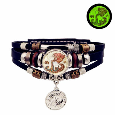 Multilayered bracelet with decorative elements on a white background