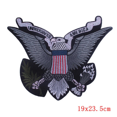 Embroidered patch of an eagle with American flag design on a white background