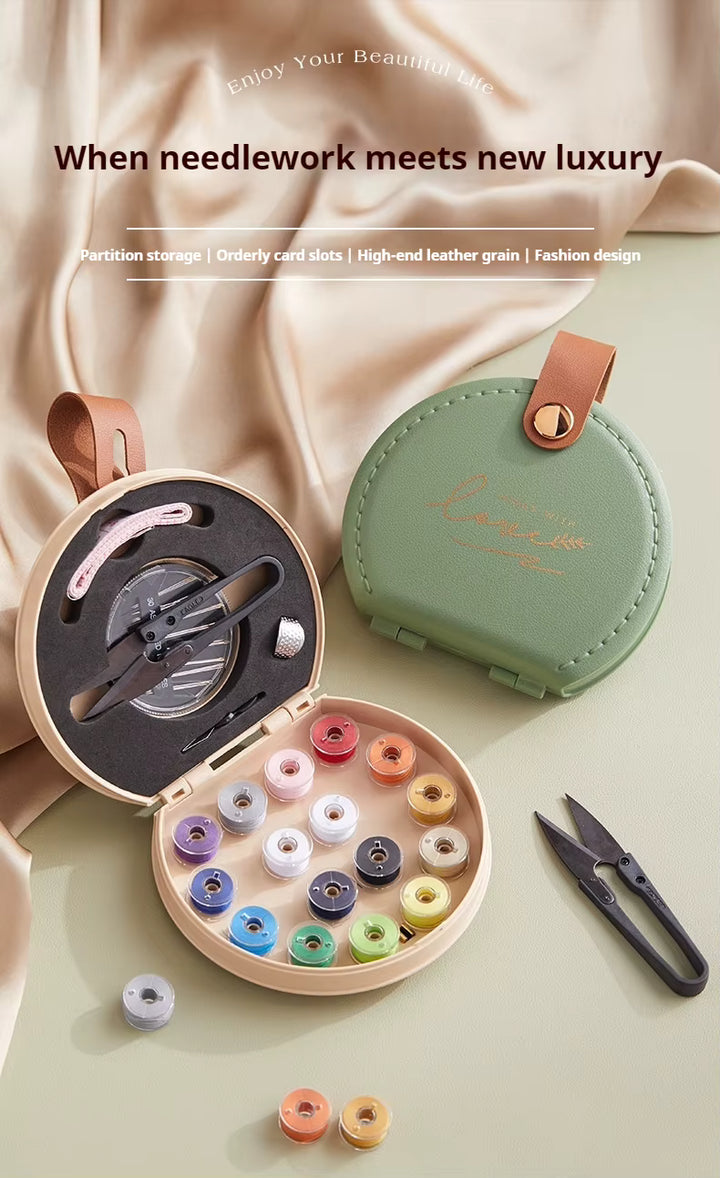Luxury round sewing kit box with colorful thread spools, needles, scissors and sewing accessories