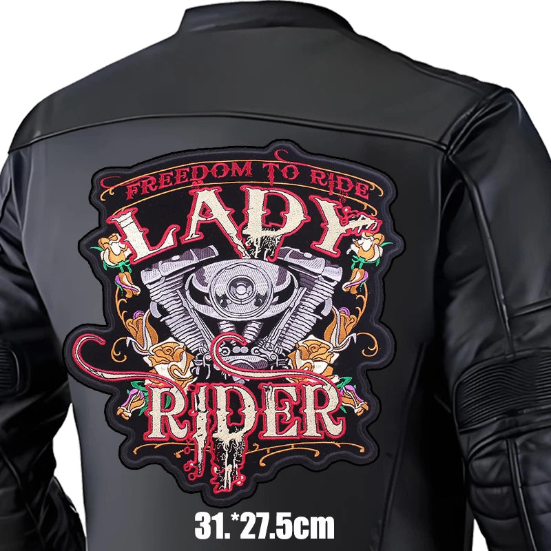 Black leather jacket with 'Lady Rider' graphic on the back