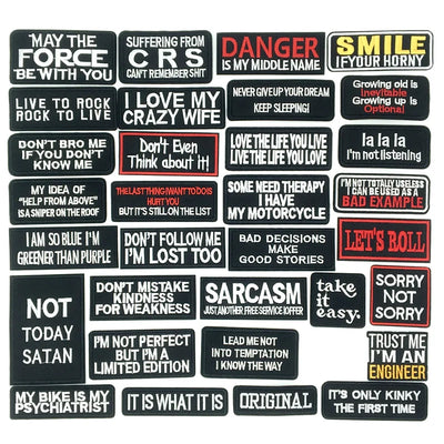 Collection of various bumper stickers with different sayings on a black background