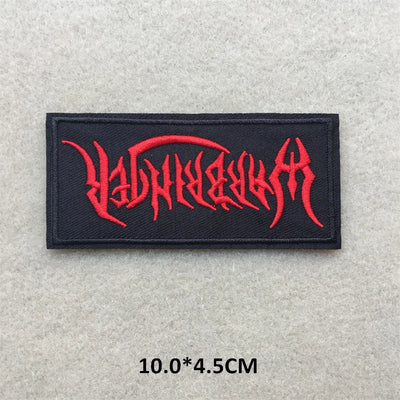 Black patch with red text on a gray background