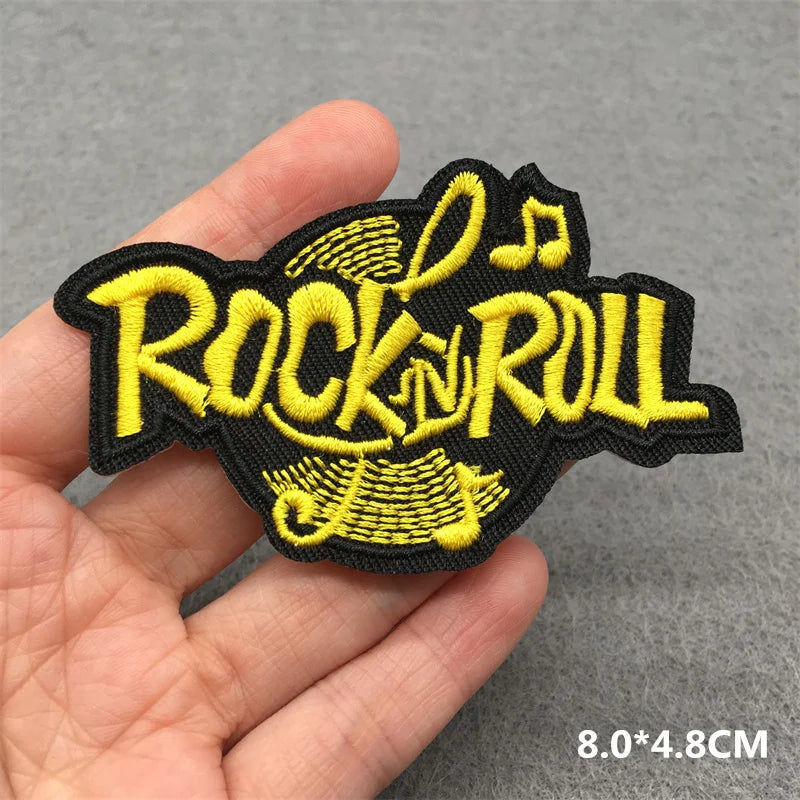 Yellow and black embroidered Rock N Roll iron on patch with vinyl record and music note design 8x4.8cm