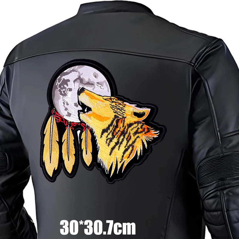 Black jacket with a wolf and moon design on the back, size 30x30.7cm.
