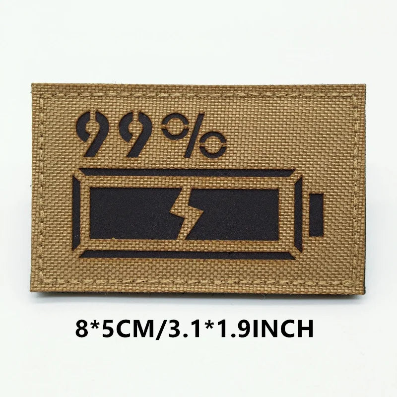 Rectangular patch with '99%' design on a brown background