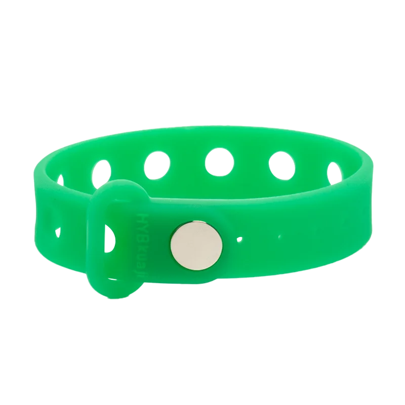 Green wrist band with a silver buckle on a white background