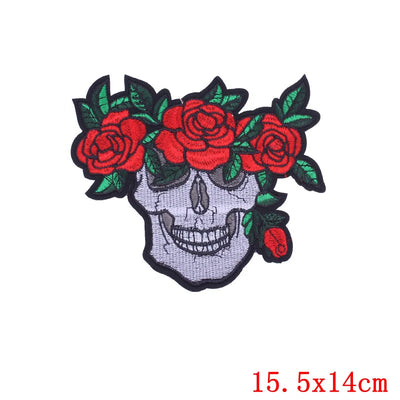 Skull patch with red roses on a white background