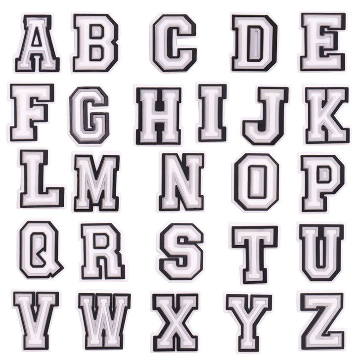 shoe charms White letters A to Z on a black background