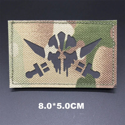 Multicam patch with a logo on a dark background