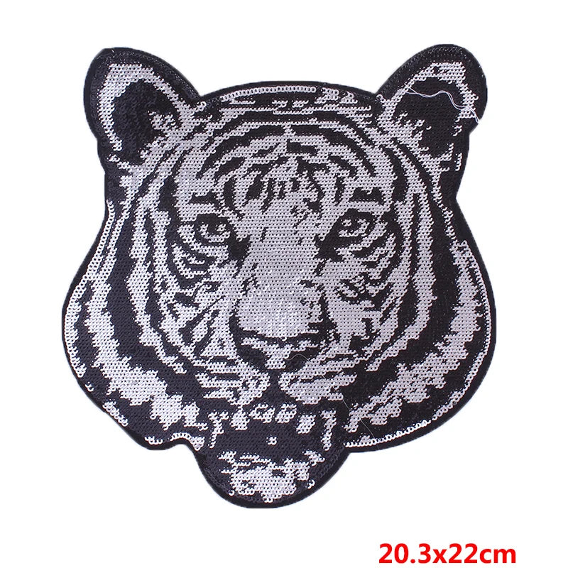 Tiger head patch with sequins on a white background