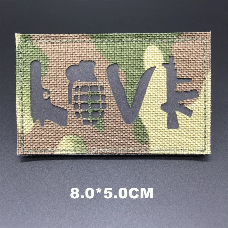 Camouflage patch with 'LOVE' text on a dark background