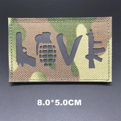 Camouflage patch with 'LOVE' text on a dark background