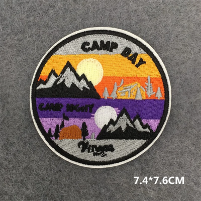Circular patch with camping design and 'Camp Day' text on a gray background