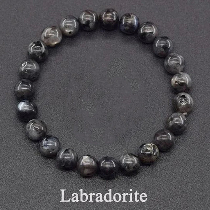 Labradorite bracelet on a dark gray background