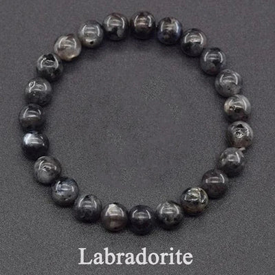 Labradorite bracelet on a dark gray background