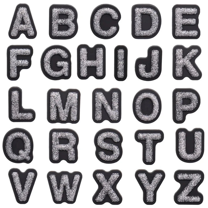 shoe charms Black and silver glittery letters A to Z on a white background