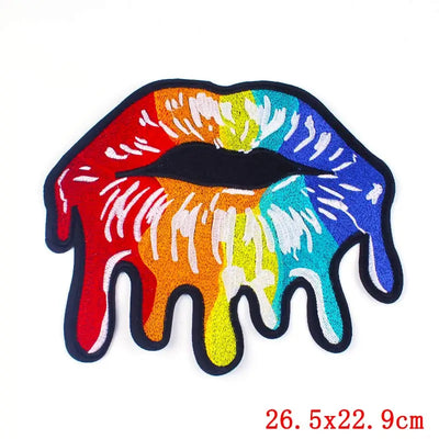 Colorful lips patch with rainbow design on a white background
