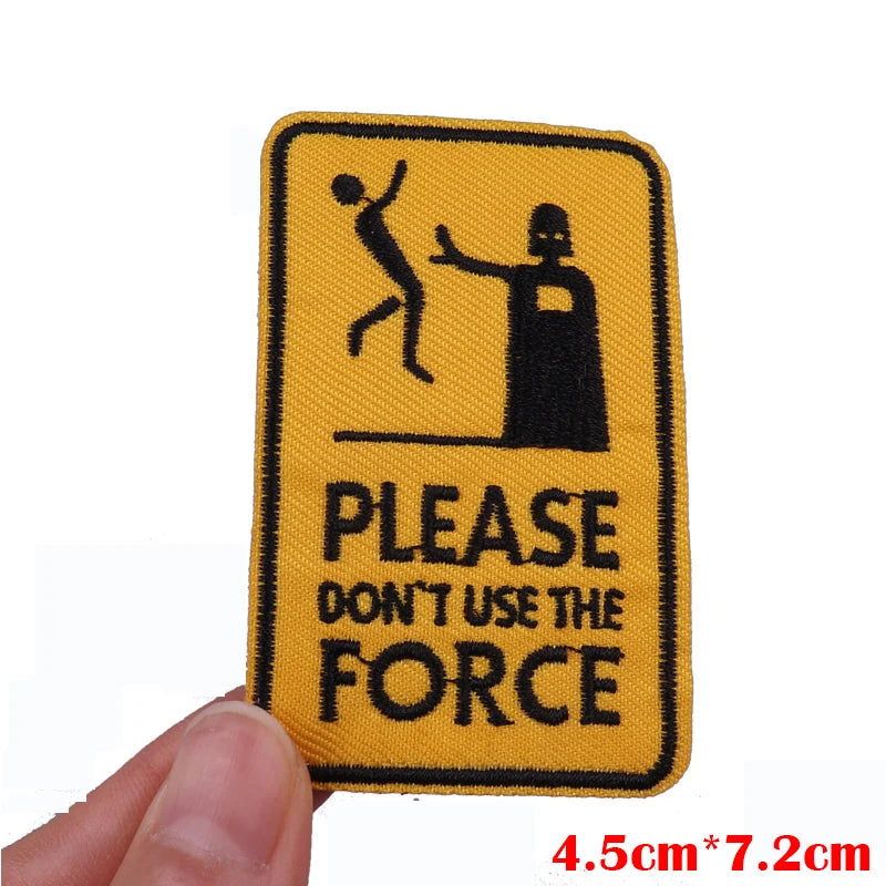Patch with 'Please don't use the force' text and symbols on a yellow background