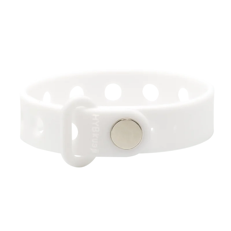 White silicone bracelet with a silver button clasp on a white background