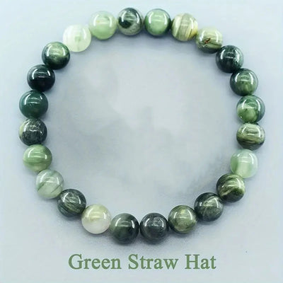 Green beaded bracelet on a white background with 'Green Straw Hat' text.