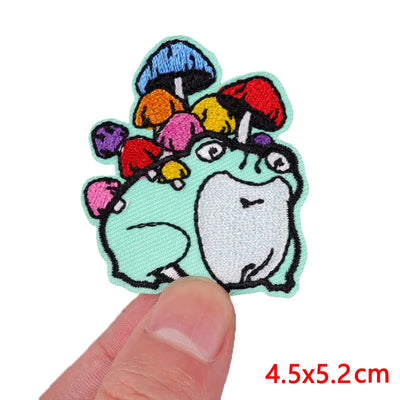Colorful cartoon patch held by a finger with size indication