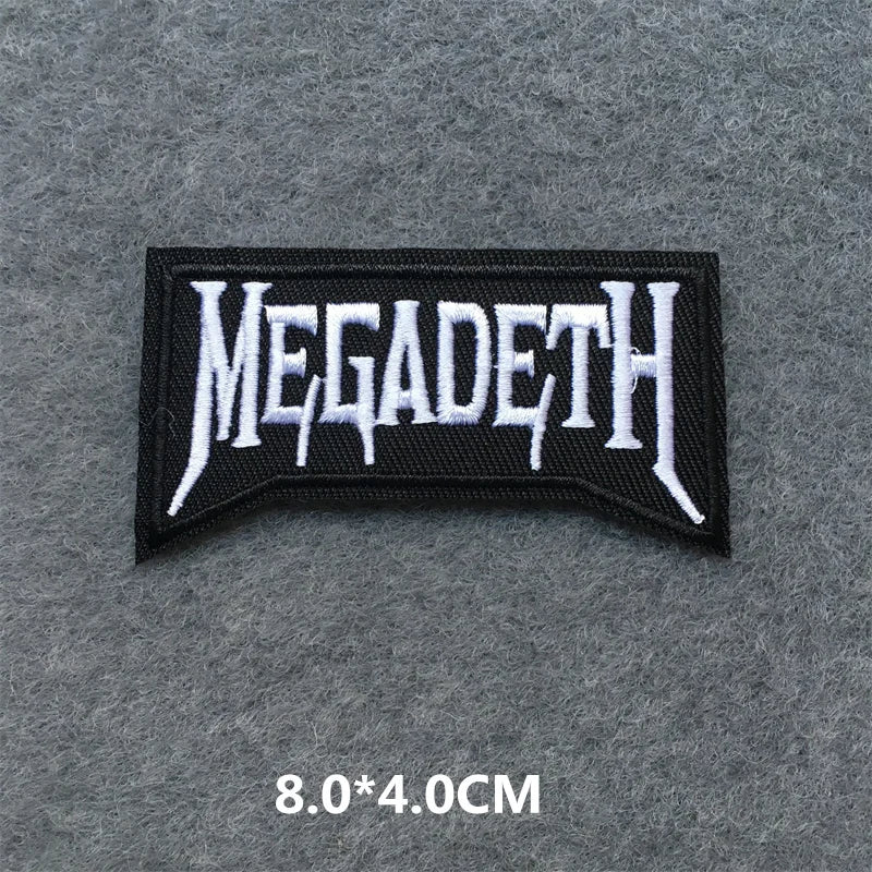 Megadeth logo patch on a gray background with dimensions indicated.