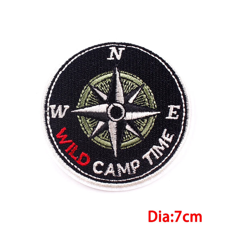 Compass patch with 'Wild Camp Time' text on a black background