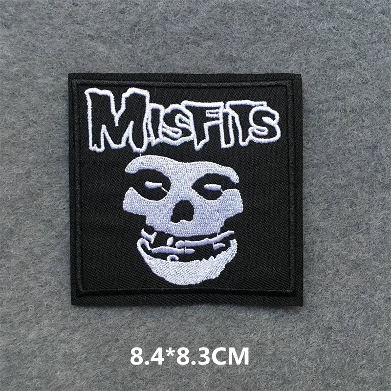 Embroidered patch with 'Misfits' logo on a gray background