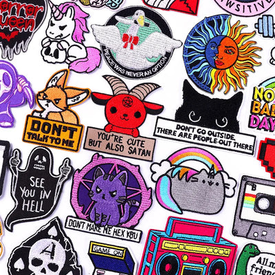 Collection of various colorful patches with different designs and text.