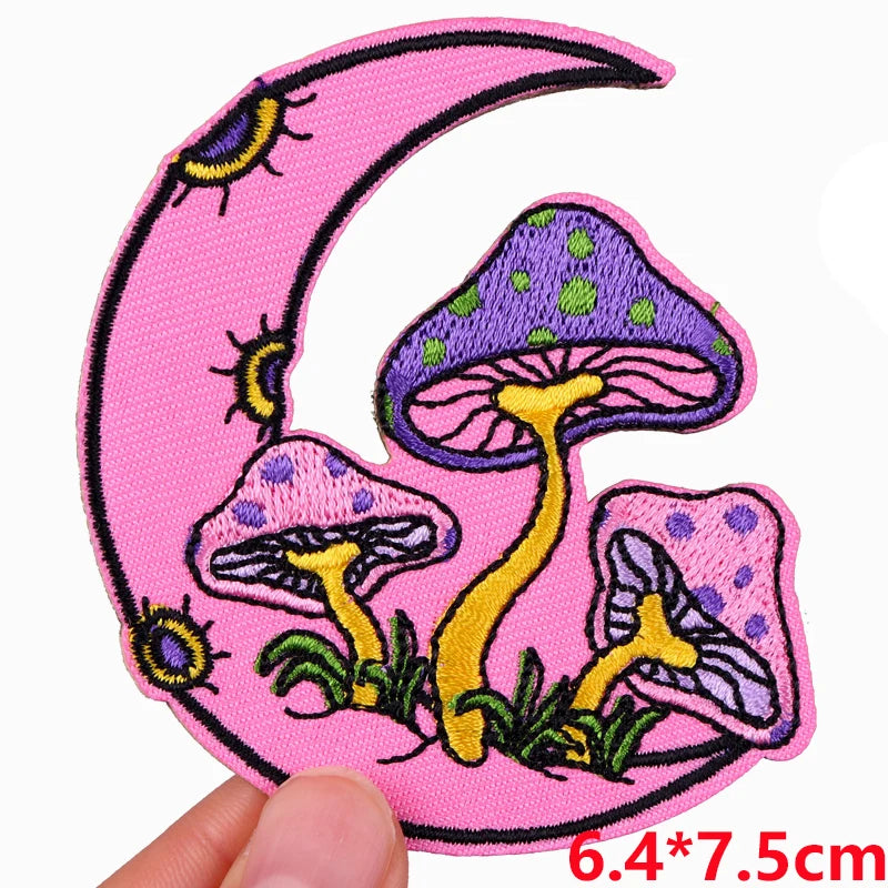 Patch with mushrooms and a pink crescent moon on a white background