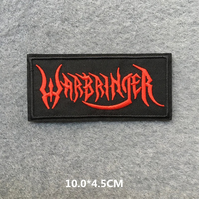Black patch with red 'Warbringer' text on a gray background