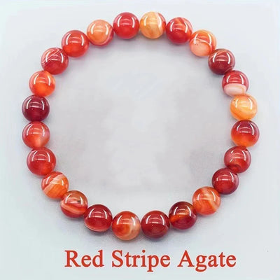 Red stripe agate bracelet on a light gray background