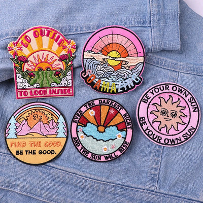 Set of five colorful patches on a denim jacket