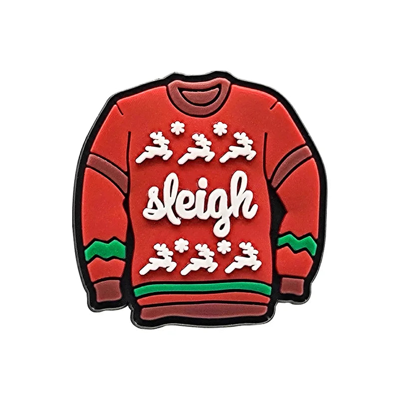 Shoe charm ornament of Red sweater-shaped enamel pin with 'sleigh' text and reindeer design on a white background