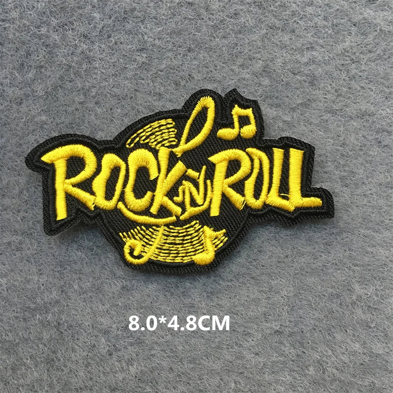 Yellow 'Rock N Roll' patch on a gray background