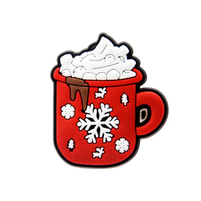 Shoe charm ornament of Red mug with hot chocolate and whipped cream on a white background