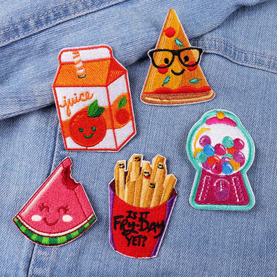 Set of colorful patches on a denim background