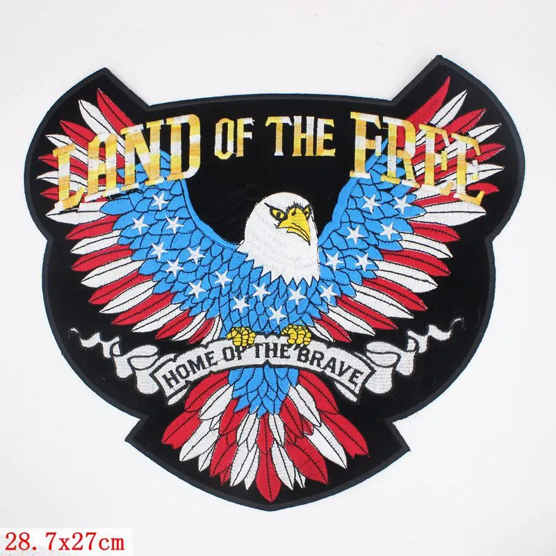 Eagle emblem with 'Land of the Free Home of the Brave' text on a white background