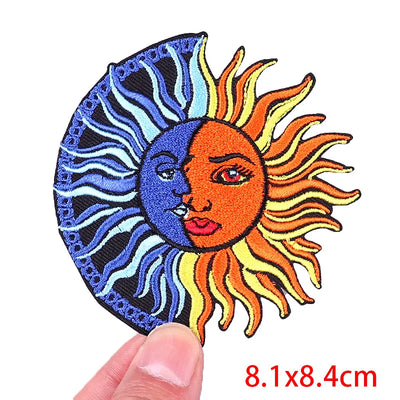 Sun and moon design patch held by a hand with size label '8.1x8.4cm'.